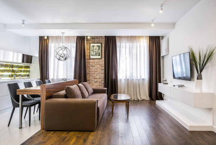 meubels als scheidingswand in het interieur van de keuken-woonkamer