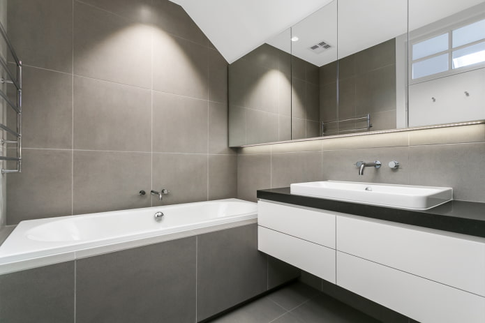 tegels in het interieur van een badkamer in minimalistische stijl