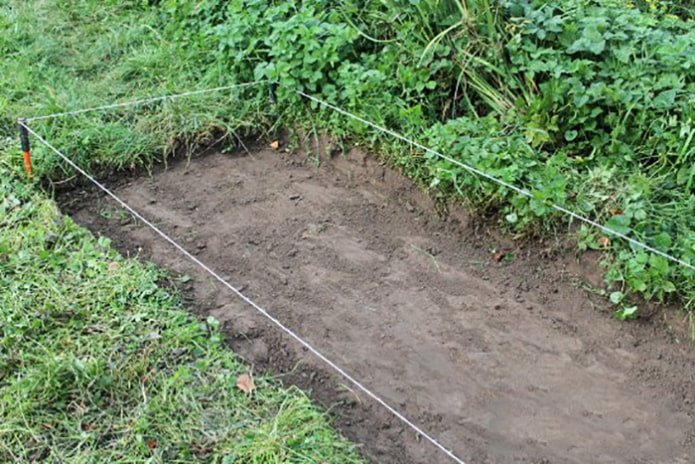 Het verwijderen van de graszoden