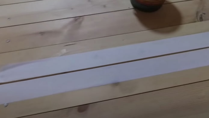 afplaktape op de vloer