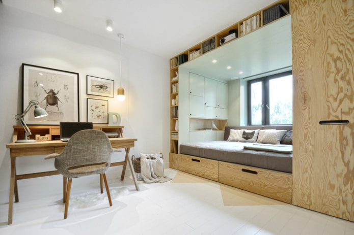 kledingkast met bed rond raam in het interieur