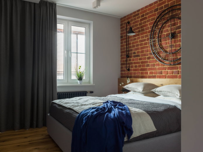 zwarte gordijnen in een loft-stijl slaapkamer
