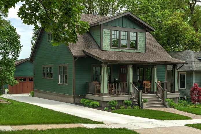 smaragdgroen huis met grijs dak