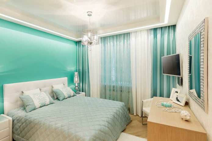 interieur van een wit-turquoise slaapkamer
