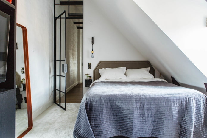 slaapkamer op zolder in Scandinavische stijl