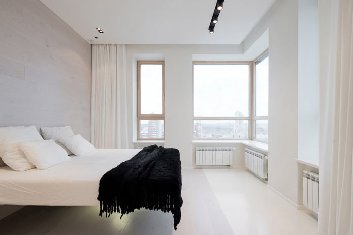 Textiel in het interieur van de slaapkamer in minimalistische stijl