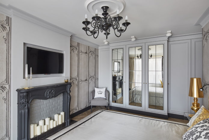 TV-paneel boven de open haard in het interieur van de slaapkamer