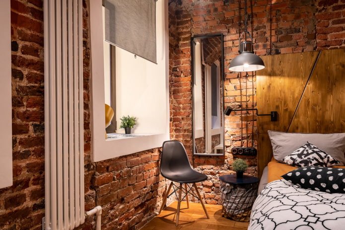 Hanglamp in een loft-slaapkamer