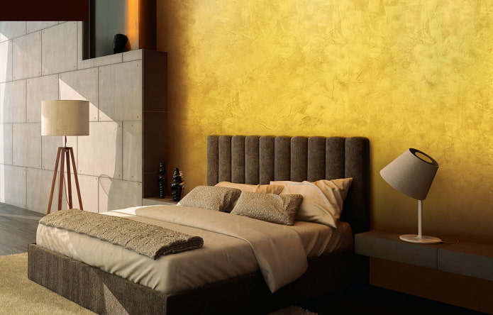 Venetiaanse decoratieve pleister onder goud in het interieur