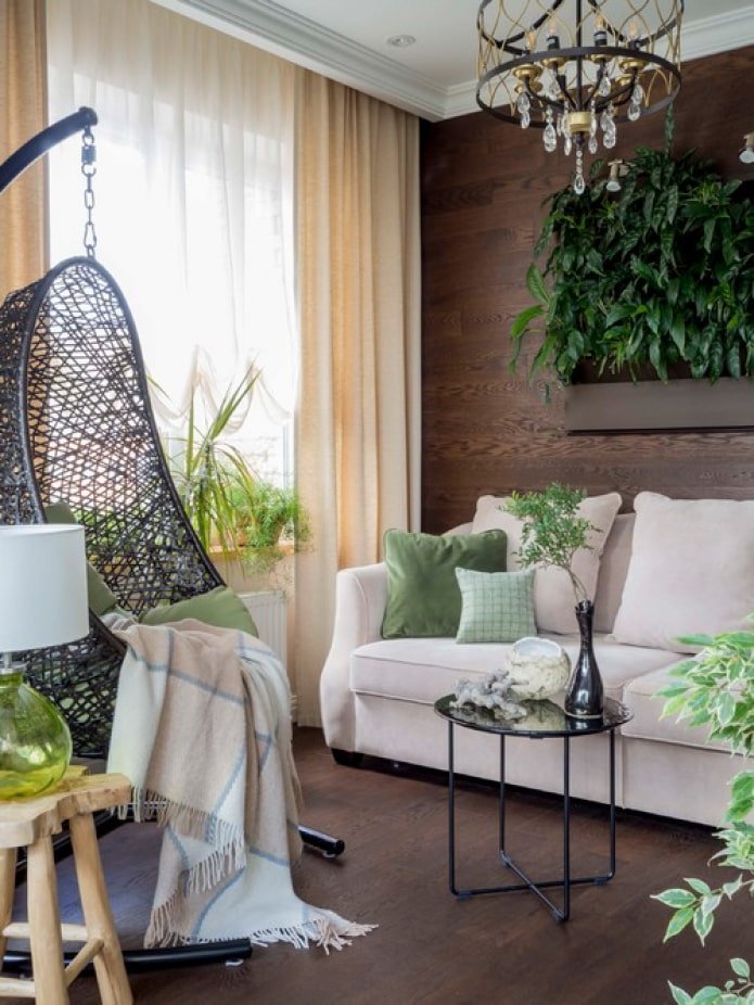 schilderij van planten boven de bank