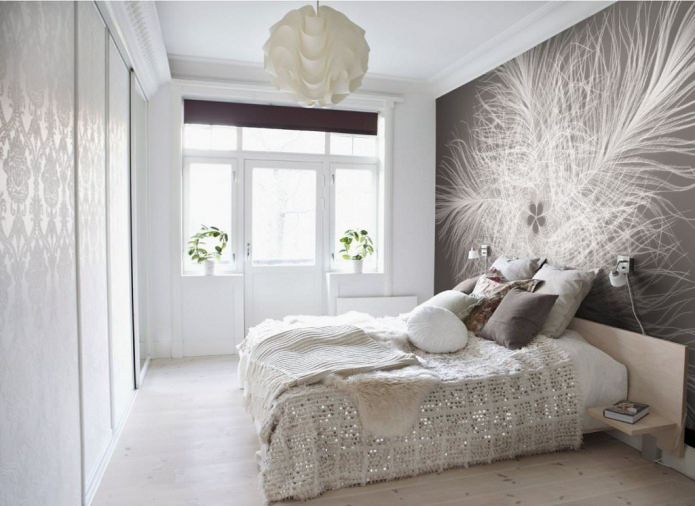fotobehang op de muur in de slaapkamer 