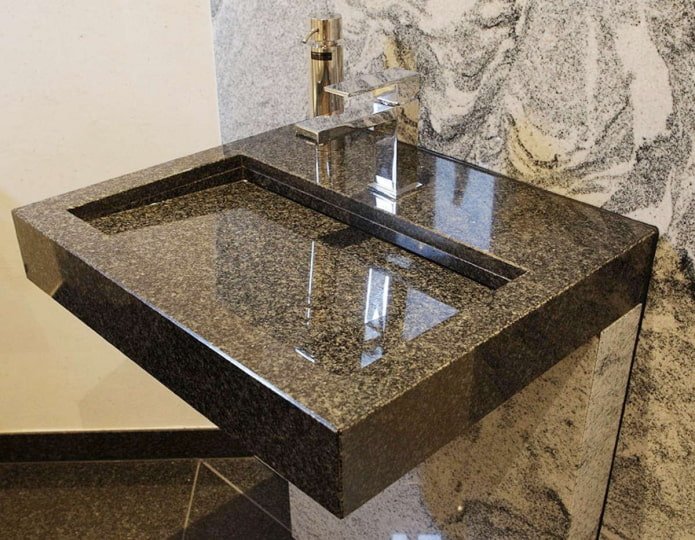 zwart granieten vloeibaar stenen spoelbak