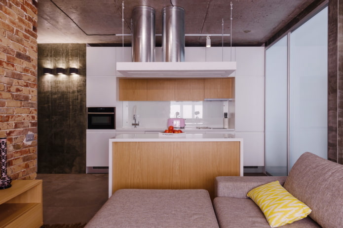 zonering met een eiland in het interieur van de woonkeuken
