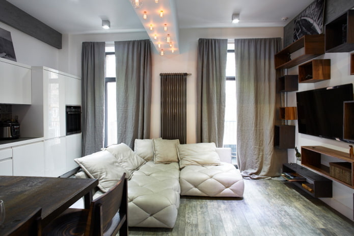 zonering met verlichting in het interieur van de keuken-woonkamer