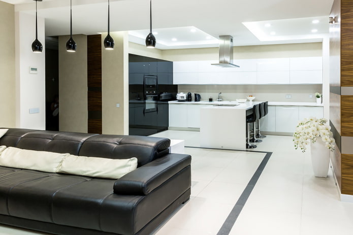 zonering met verlichting in het interieur van de keuken-woonkamer